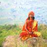 Swamiji Thiruvannamalai in the background, rock where he g~1_CMP_WM