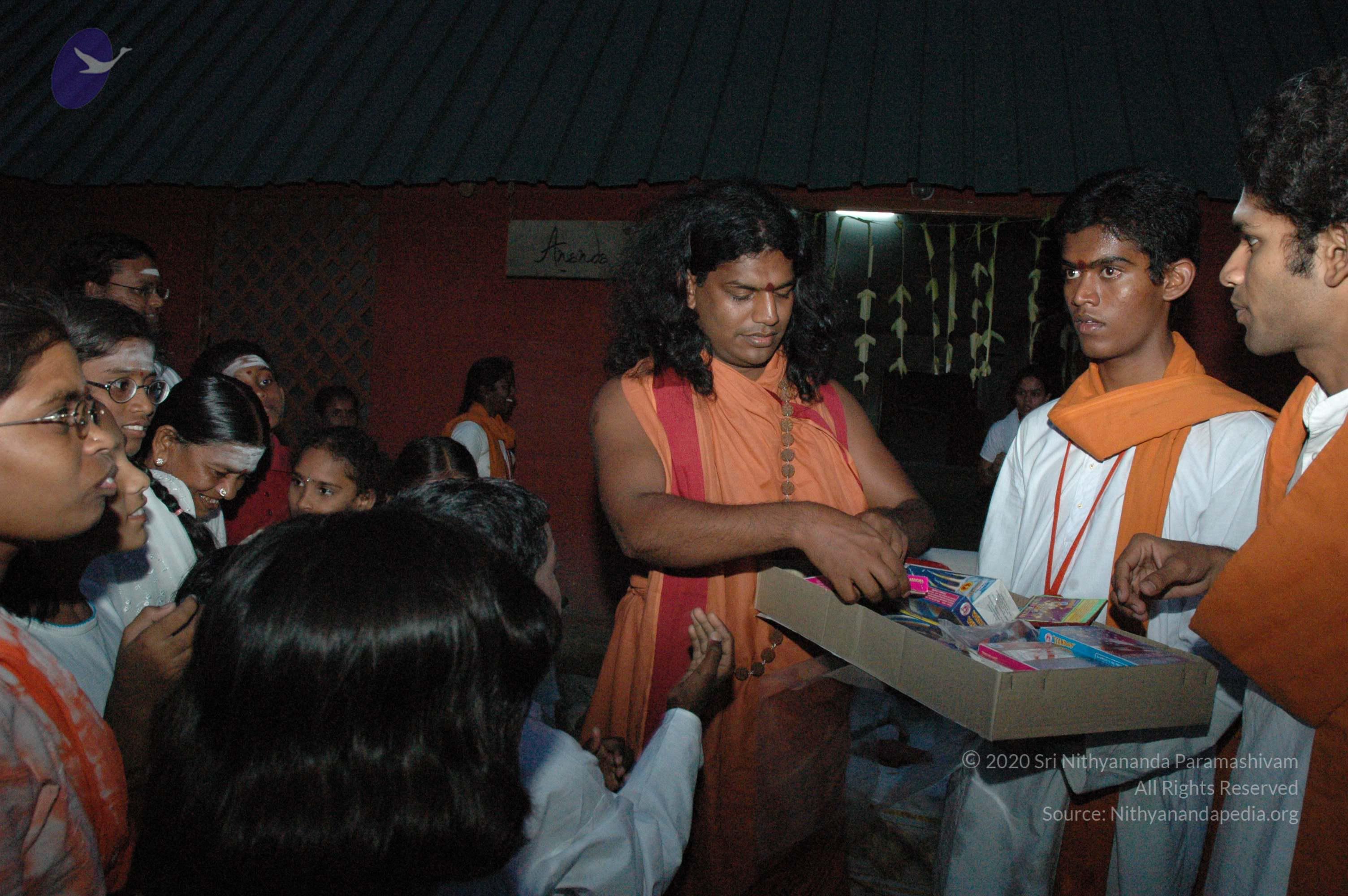 20061021_Photo_1009_swami distributing crackers DSC_8312_CMP_WM